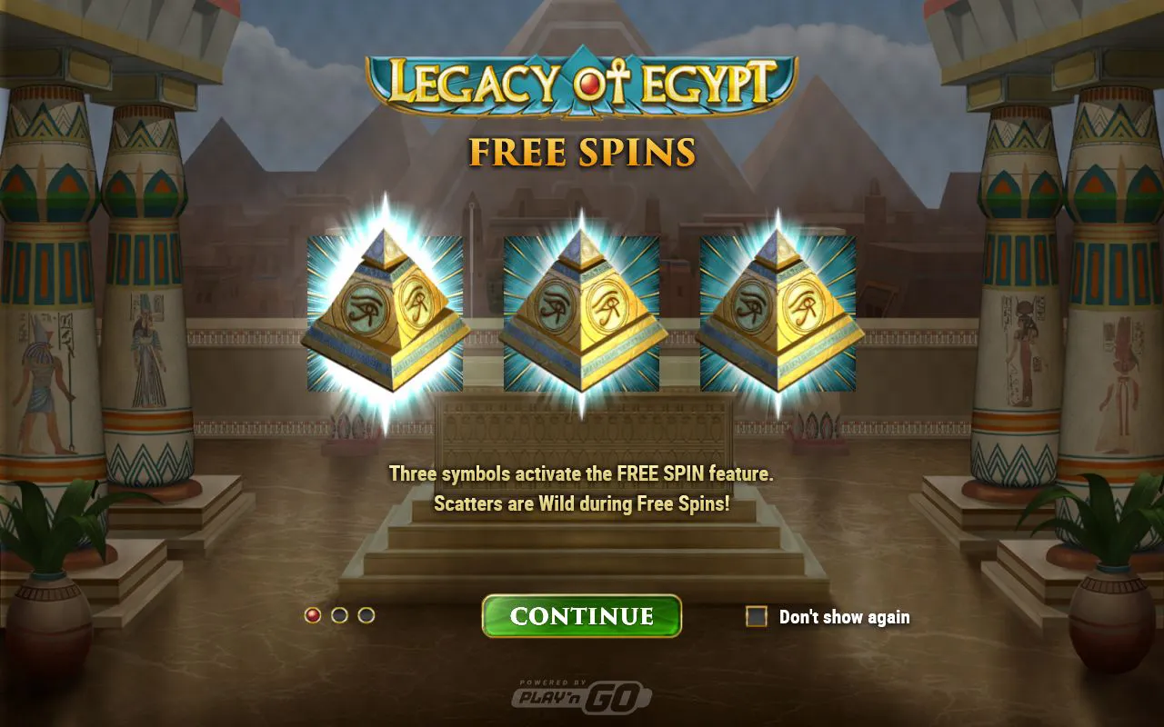 Legacy of Egypt splash screen showing three glowing pyramids and the rule that scatters turn wild during the feature