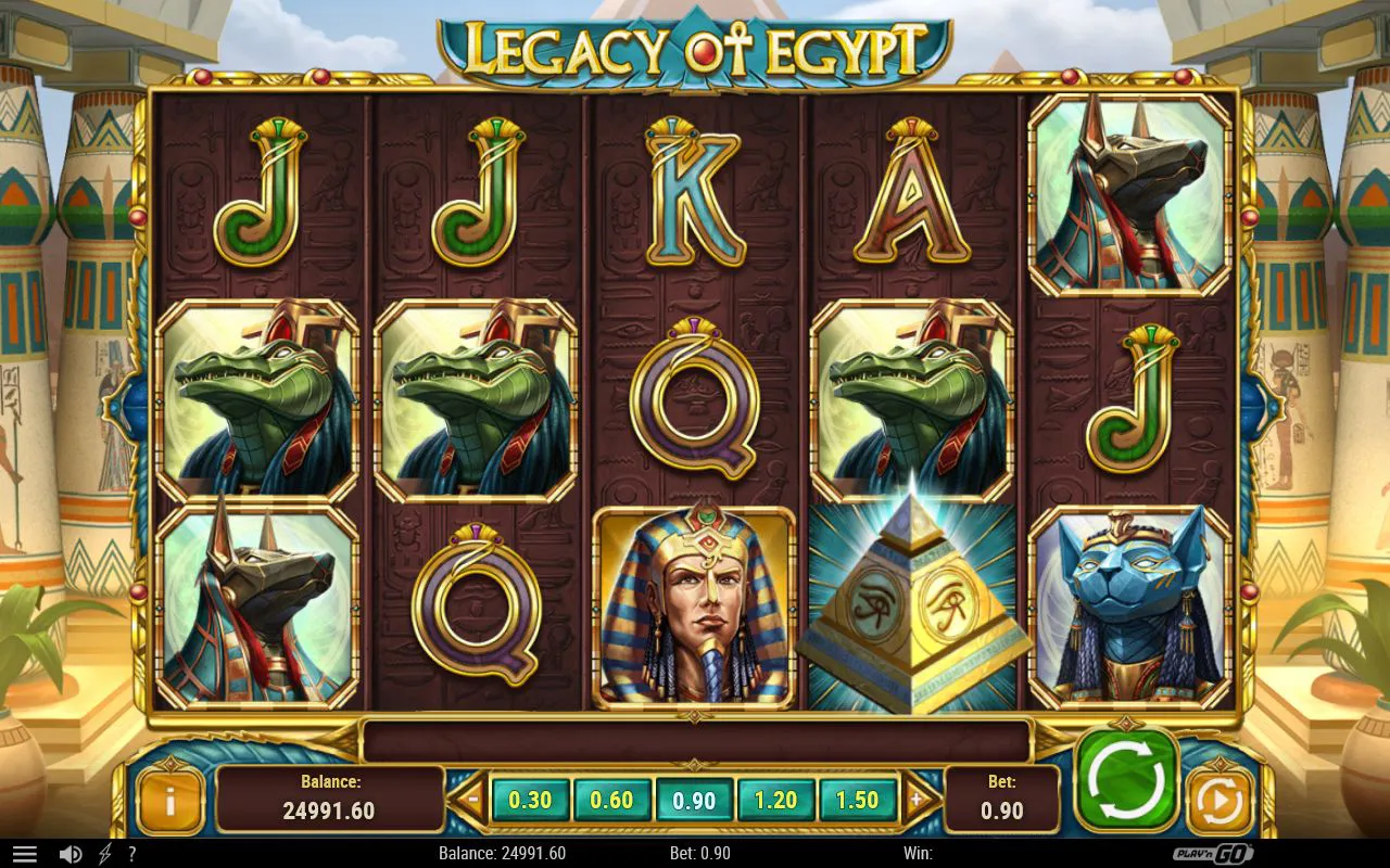 Base spin stacked with green Sobek and jackal-headed Anubis symbols and a pyramid scatter on the fourth reel